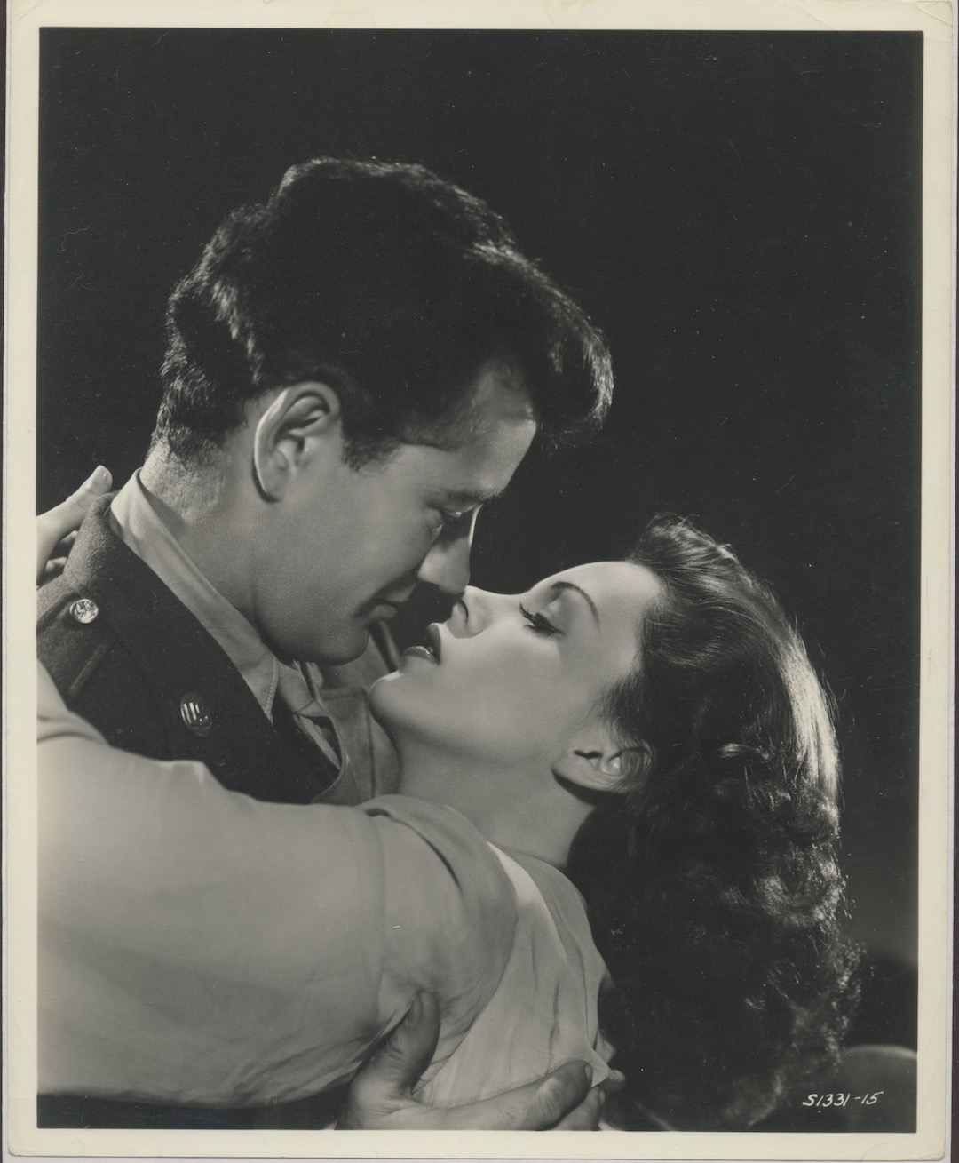 A GLAMOROUS JUDY GARLAND/ROBERT WALKER ORIGINAL STUDIO PHOTO. A BOY AND A GIRL IN LOVE. 1945.