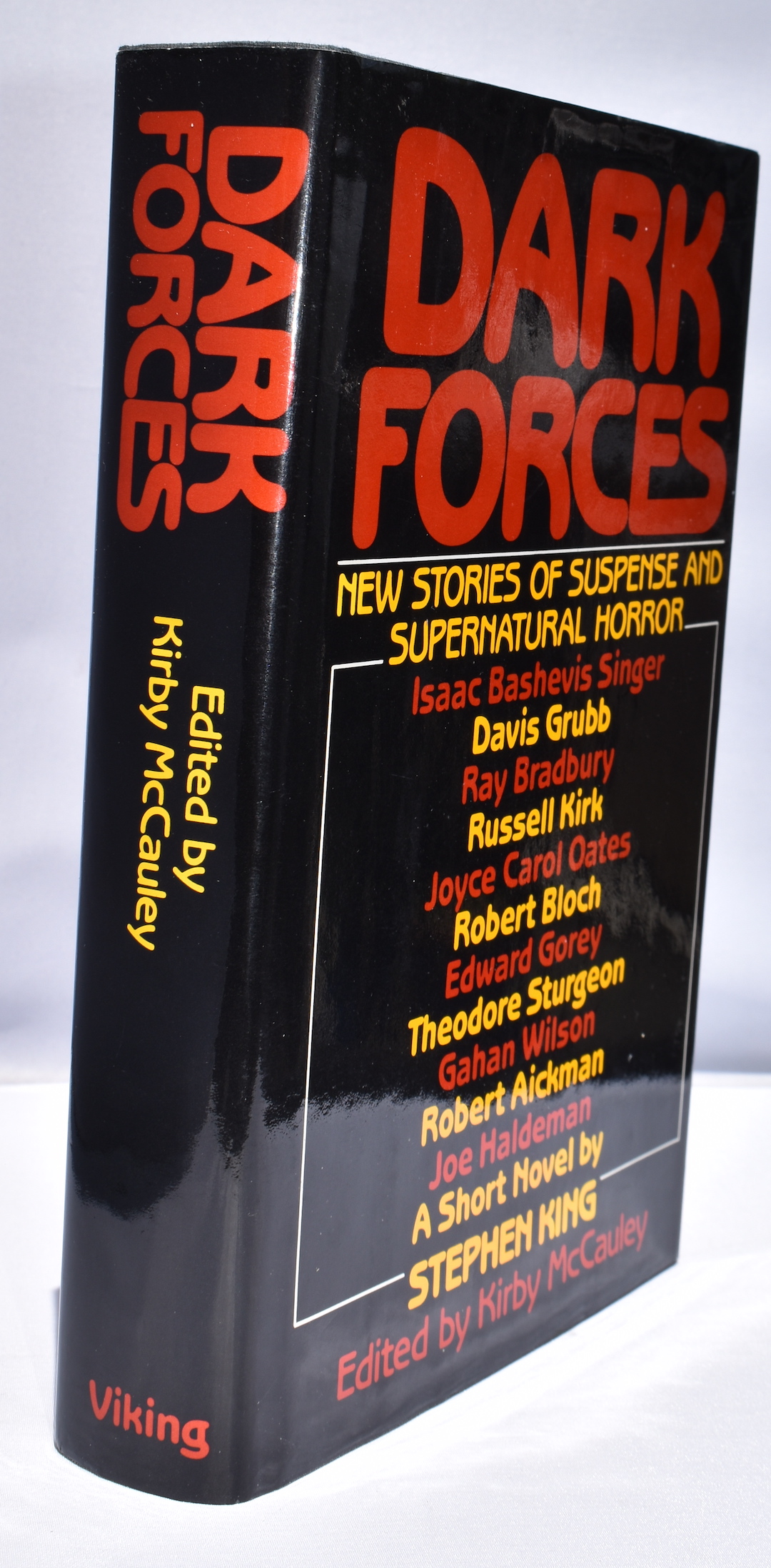 DARK FORCES: Viking Press, 1980. This copy is signed by Ray Bradbury, Robert Bloch, Ramsey Campbell, Karl Edward Wagner, Joe Haldeman, Charles Grant, Richard Matheson, Richard Christian Matheson, and Dennis Etchison.